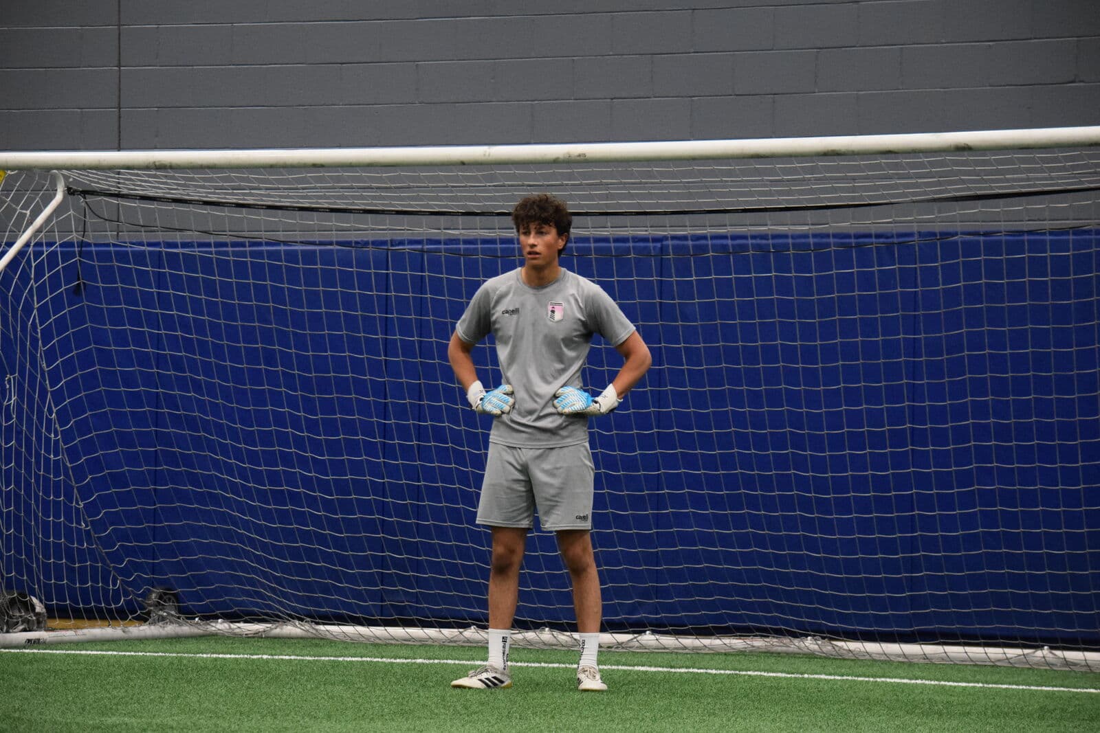 A JStarz goalkeeper set in front of the net during a goalkeeper development session.